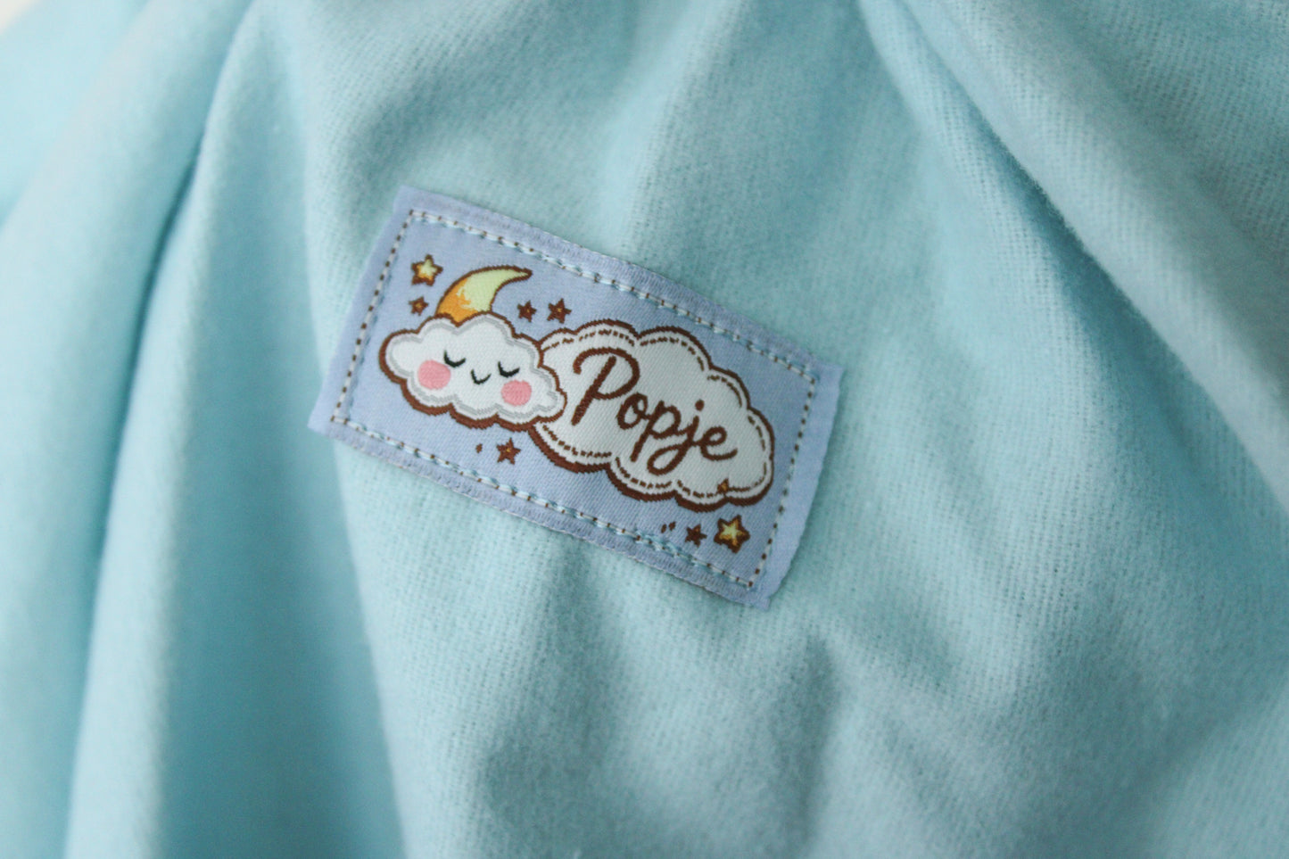Popje blauw